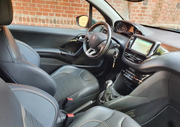 Peugeot 208 cena 24900 przebieg: 146393, rok produkcji 2014 z Mława małe 254